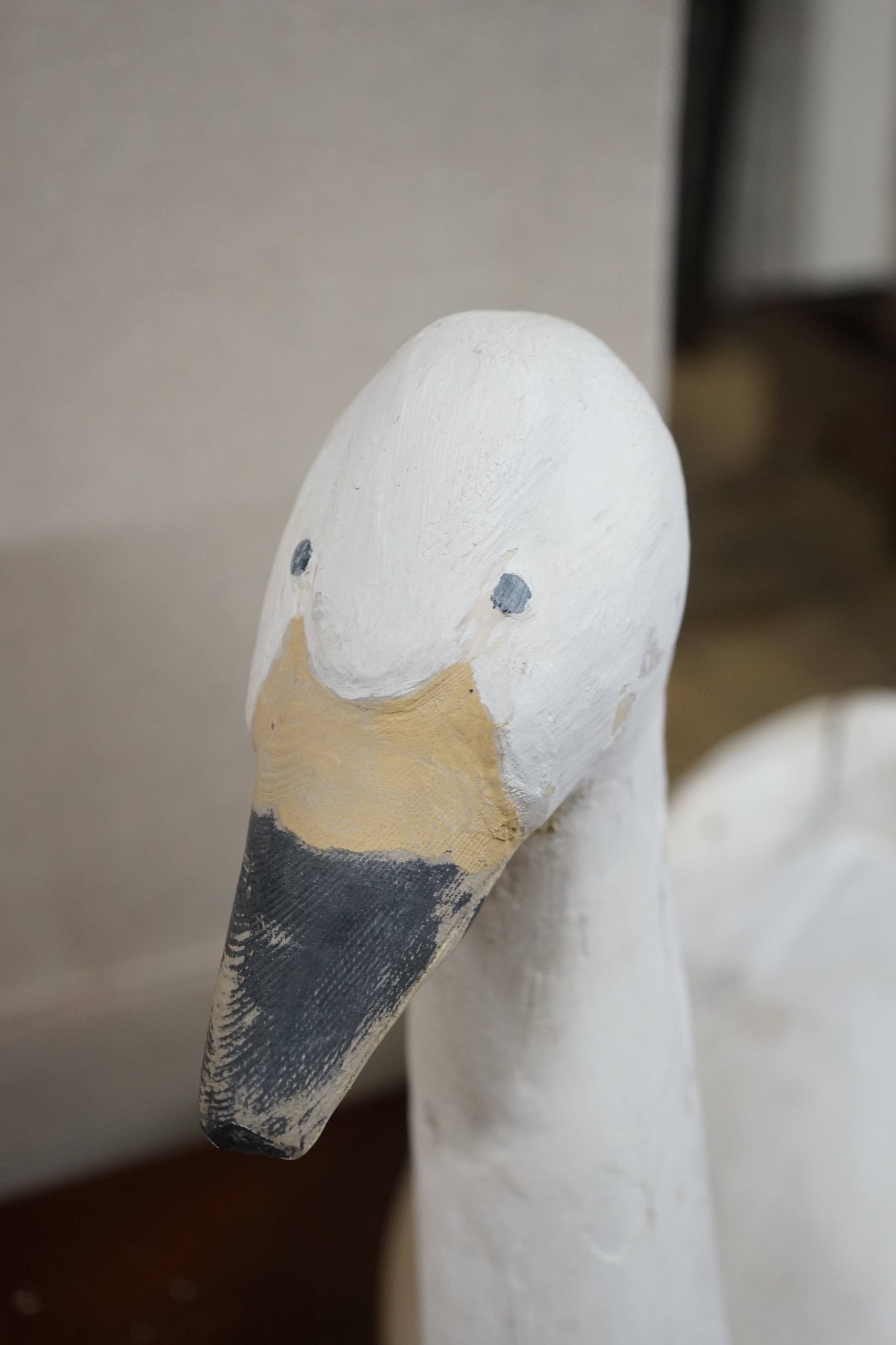 A vintage carved, painted wood swan uppers decoy, length 70cm, height 59cm